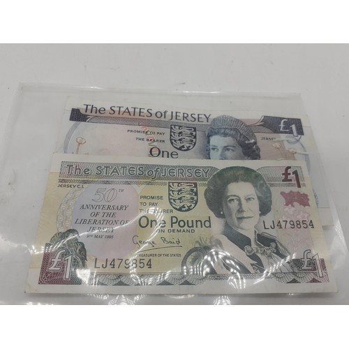 593 - 2 OF JERSEY £1 NOTES AND 4 CROWNS