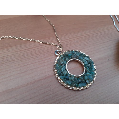 733 - A SILVER NECKLACE WITH JADESTONE PENDANT AND A JADE CHIPSTONE PENDANT ON NECKCHAIN