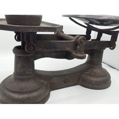 759 - A SET OF ANTIQUE CAST IRON AVERY SCALES WITH WEIGHTS WITH A COPPER PAN