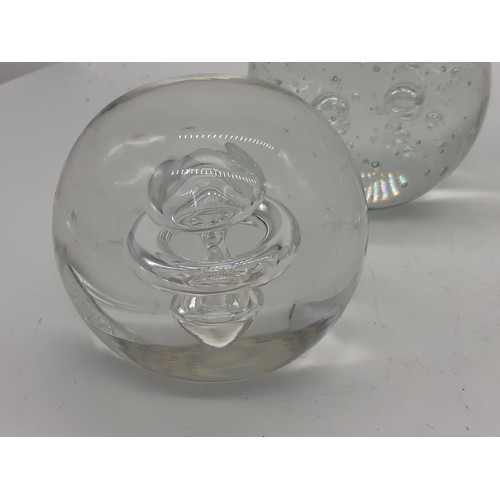 761 - 4 VERY LARGE AND HEAVY GLASS PAPERWEIGHTS