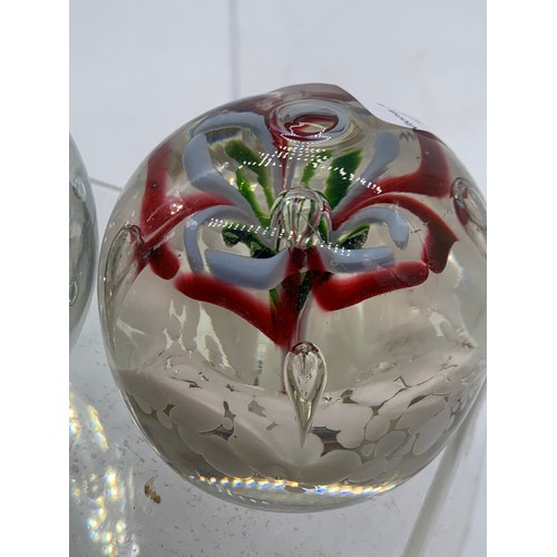 589 - 2 GLASS PAPERWEIGHTS