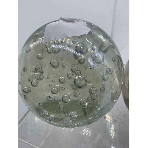 589 - 2 GLASS PAPERWEIGHTS