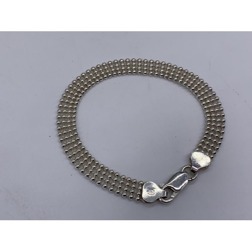 210A - A SILVER BEADED STYLE BRACELET