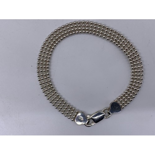 210A - A SILVER BEADED STYLE BRACELET