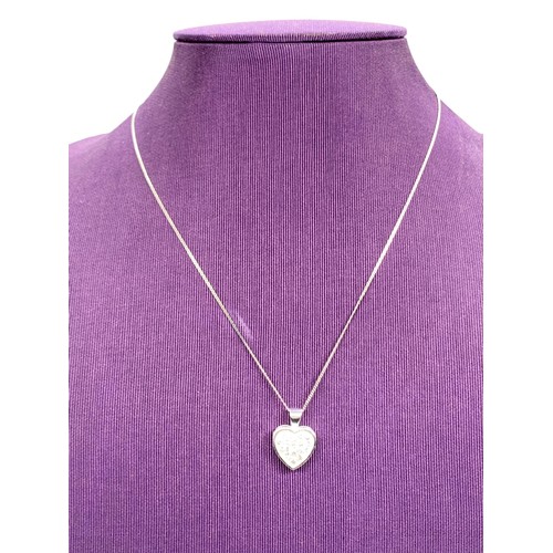 230A - A SILVER GEMSET HEART LOCKET ON A SILVER CHAIN