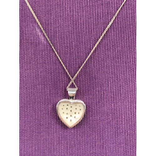 230A - A SILVER GEMSET HEART LOCKET ON A SILVER CHAIN