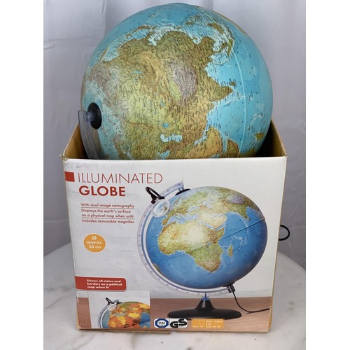 54 - AN ILLUMINATED GLOBE APPROX 30CMS BOXED