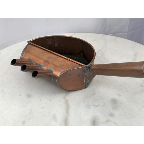 59 - AN ANTIQUE COPPER POURING POT WITH 3 SPOUTS A DIA OF 14