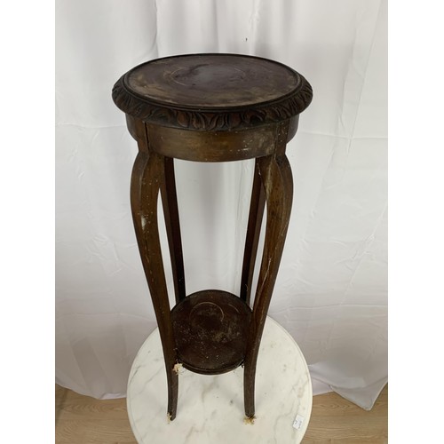 132 - A CARVED MAHOGANY PLANTSTAND 37X12