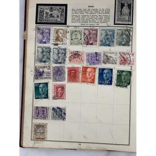 137 - A GLOBE TROTTER STAMP ALBUM & SOME STAMPS