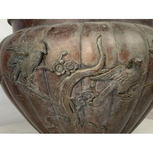 138 - ORIENTAL BRONZE POT/JARDINAIRE WITH STORKS & MARKINGS TO THE BASE