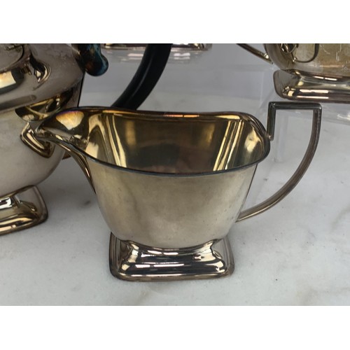 80 - AN ART DECO 4 PIECE SILVER PLATED SERVICE