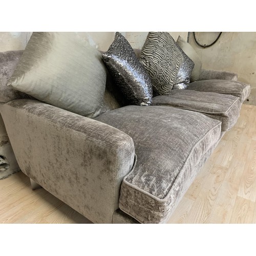 109 - A LARGE 4 SEATER SETTEE
