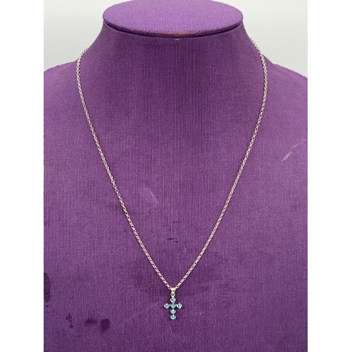 152 - A SILVER CHAIN AND CROSS
