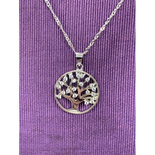157 - A STERLING SILVER TREE OF LIFE PENDANT ON SILVER CHAIN