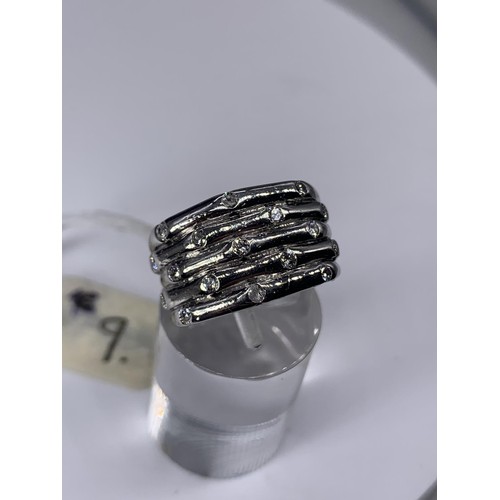 158 - BAMBOO STYLE RING STAMPED 18CT WHITE GOLD SET WITH 17 DIAMONDS WEIGHS 11.6GRAMS TOTAL SIZE L/M