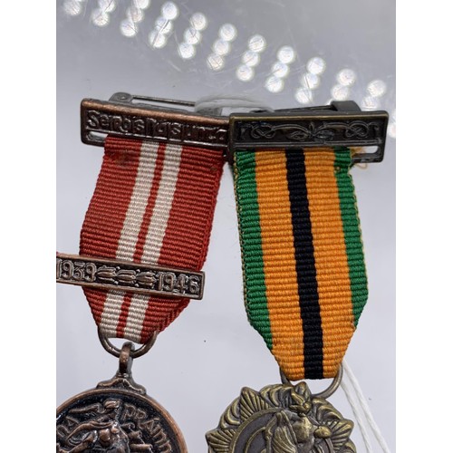 181 - 2 MINTURE IRISH MEDALS