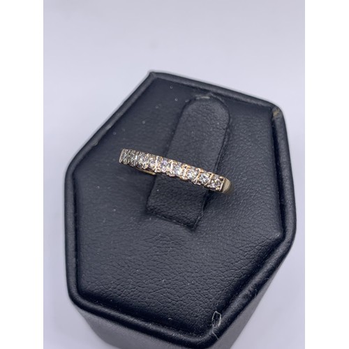 191 - FINE BAND ETERNITY RING SET WITH DIAMONDS IN 18CT YELLOW GOLD