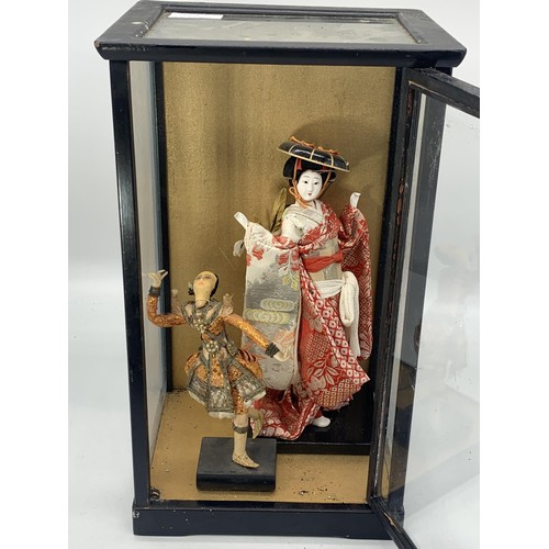 196 - ANTIQUE CASE CONTAINING ORIENTAL FIGURINES 14X8X7