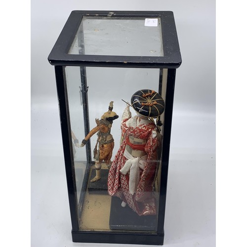 196 - ANTIQUE CASE CONTAINING ORIENTAL FIGURINES 14X8X7