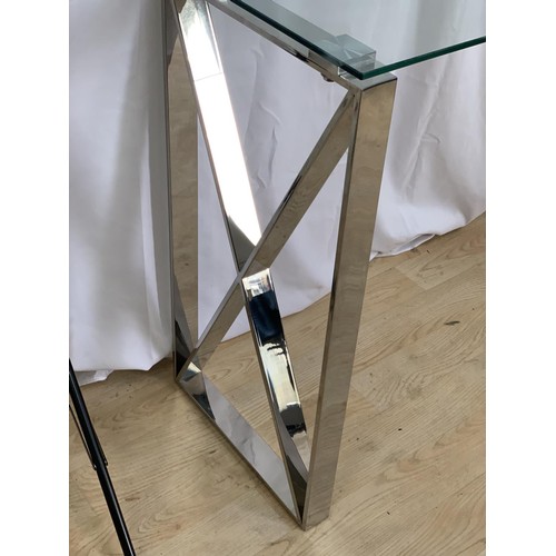 269 - A CHROME AND GLASS CONSOL TABLE