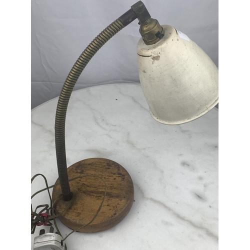 292 - A VERY OLD ANGLE POISE LAMP WITH A WEIGHTED WOODEN BASE