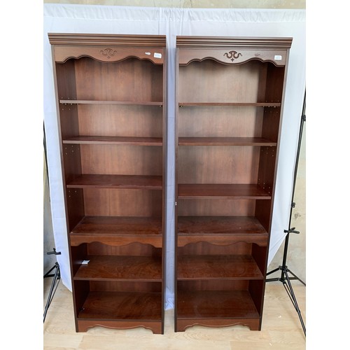 445 - A PAIR OF MAHOGANY BOOKSHELVES 74X24