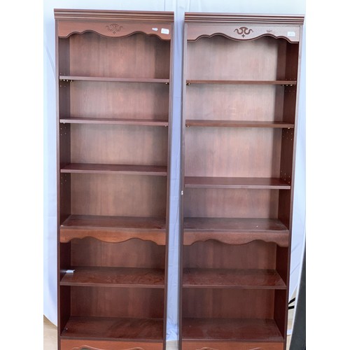 445 - A PAIR OF MAHOGANY BOOKSHELVES 74X24