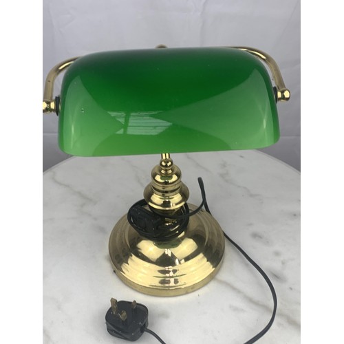 764 - A BRASS BASED BANKERS LAMPP WITH GREEN GLASS SHADE