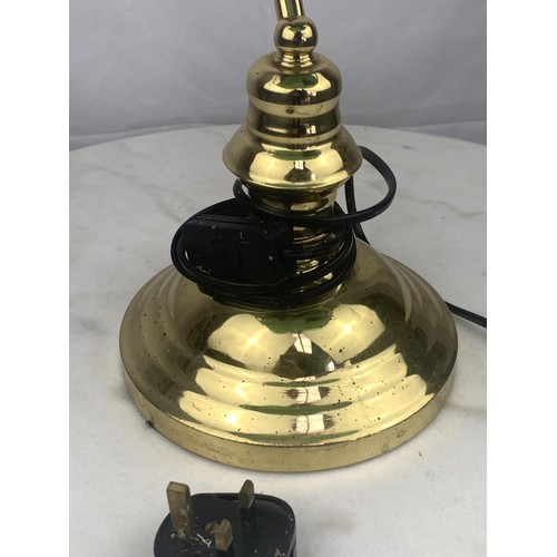 764 - A BRASS BASED BANKERS LAMPP WITH GREEN GLASS SHADE