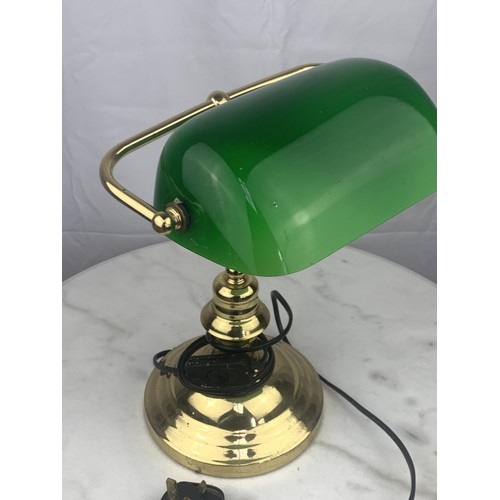 764 - A BRASS BASED BANKERS LAMPP WITH GREEN GLASS SHADE