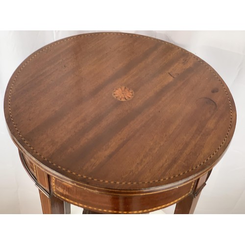 765 - AN ANTIQUE CIRCULAR TABLE WITH INLAID SHELL TO TOP