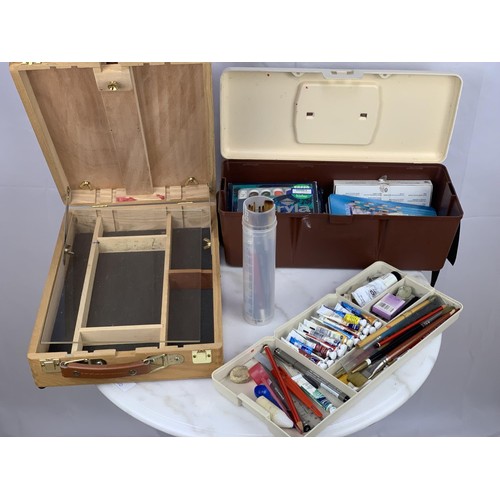 273 - A BOXED TABLE TOP ARTISTS EASLE AND BOX OF MIXED PAINTS AND BRUSHES ETC