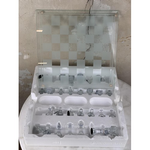 52 - A GLASS CHESS SET