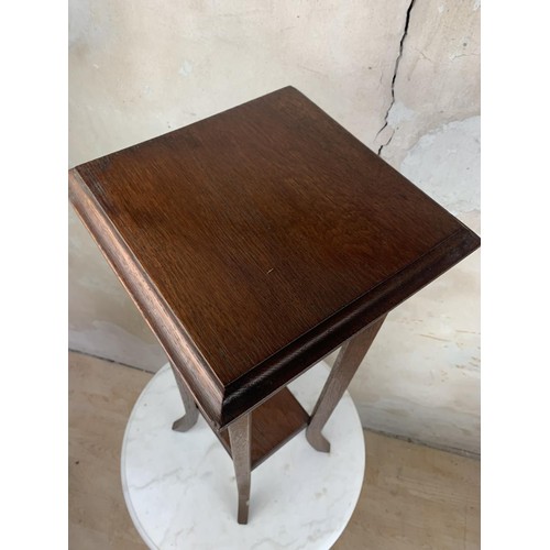 22 - A MAHOGANY PLANTSTAND