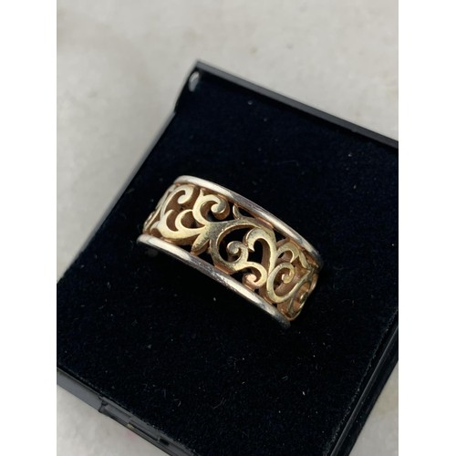 205 - A BOXED SILVER STYLE CELTIC RING