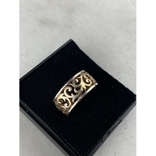 205 - A BOXED SILVER STYLE CELTIC RING