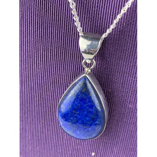 206 - A SILVER LAPIS TEAR DROP PENDANT ON SILVER CHAIN