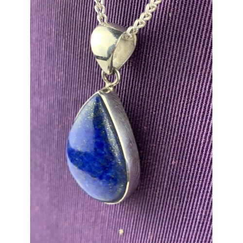 206 - A SILVER LAPIS TEAR DROP PENDANT ON SILVER CHAIN