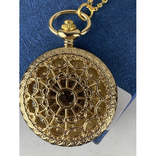 50 - A BRASS MUSICAL POCKET WATCH