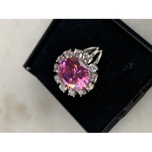 220 - A SILVER PINK AND WHITE CRYSTAL RING