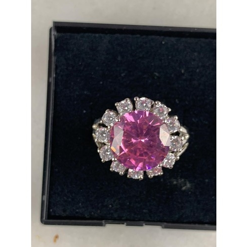 220 - A SILVER PINK AND WHITE CRYSTAL RING