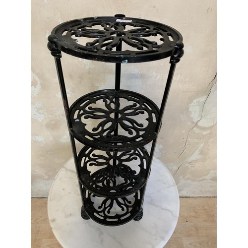 106 - A 3 TIER CAST POT STAND