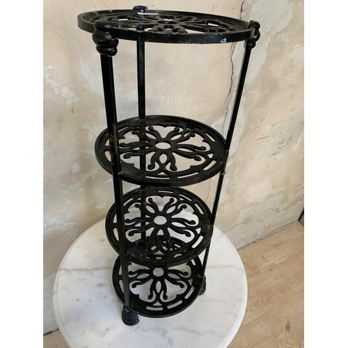 106 - A 3 TIER CAST POT STAND