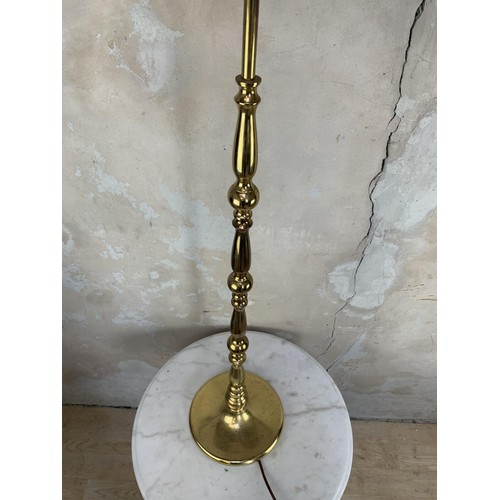 126 - A BRASS STANDARD LAMP