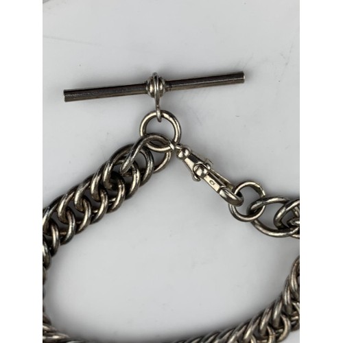 237 - A HEAVY SILVER CURB LINK WRIST CHAIN WITH T BAR