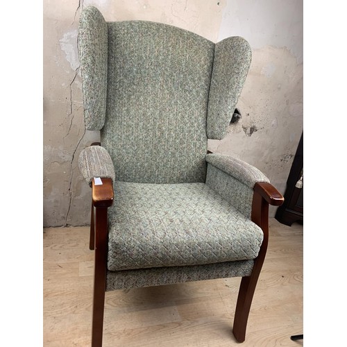 133 - A WINGBACK ARMCHAIR