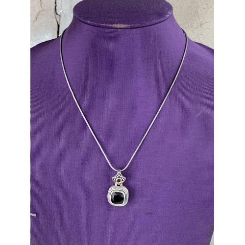 241 - A SILVER AND AMETHYST PENDANT ON SILVER CHAIN