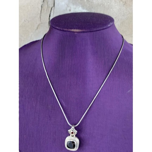 241 - A SILVER AND AMETHYST PENDANT ON SILVER CHAIN