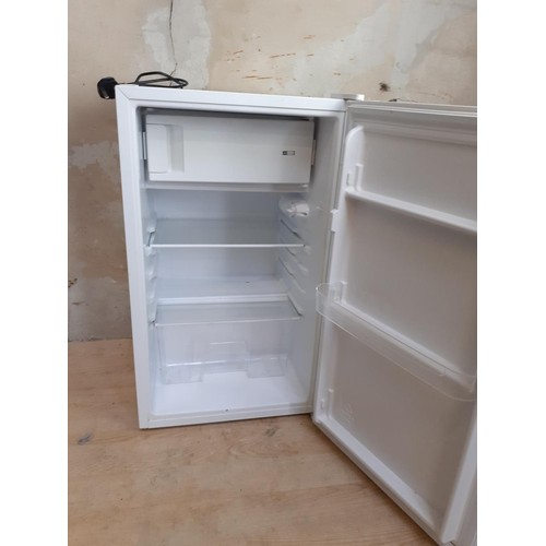 146 - AN UNDER COUNTER FRIDGE